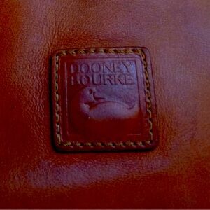 Dooney & Bourke Brown Leather Venetian purse. Excellent condition.